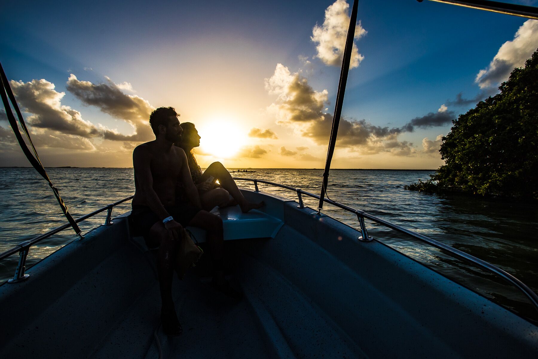 sian kaan sunset motorboat